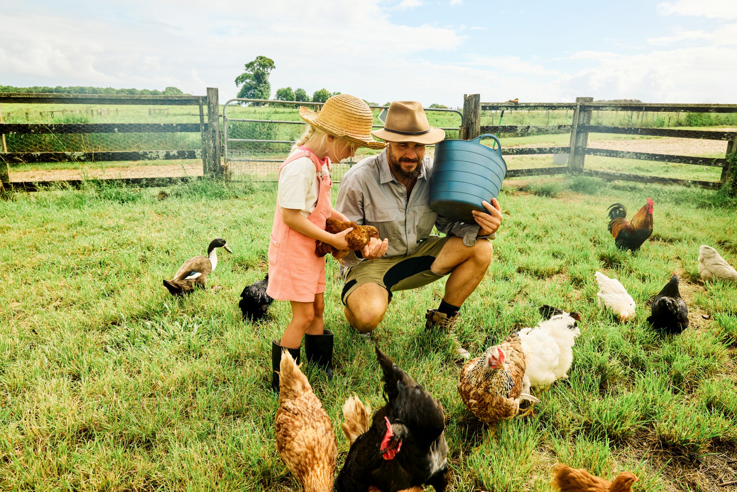 Family enjoying rural homeownership after securing a home loan